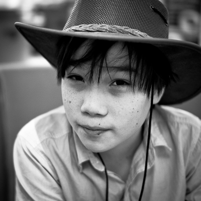 Young Michael wearing a hat